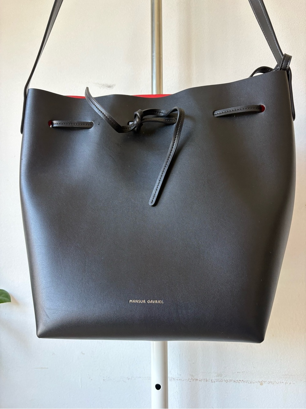 Mansur Gavriel Black Leather Drawstring Bucket Bag with Red Lining
